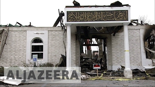 US Mosque burnt after Trump announced Muslim ban [upl. by Yrelbmik]