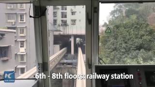 Watch This train passes through residential building in China [upl. by Noelyn]